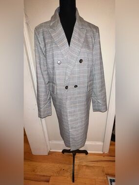 Prima Plaid Coat. New with Tags. Size: M.
Asking: $98.